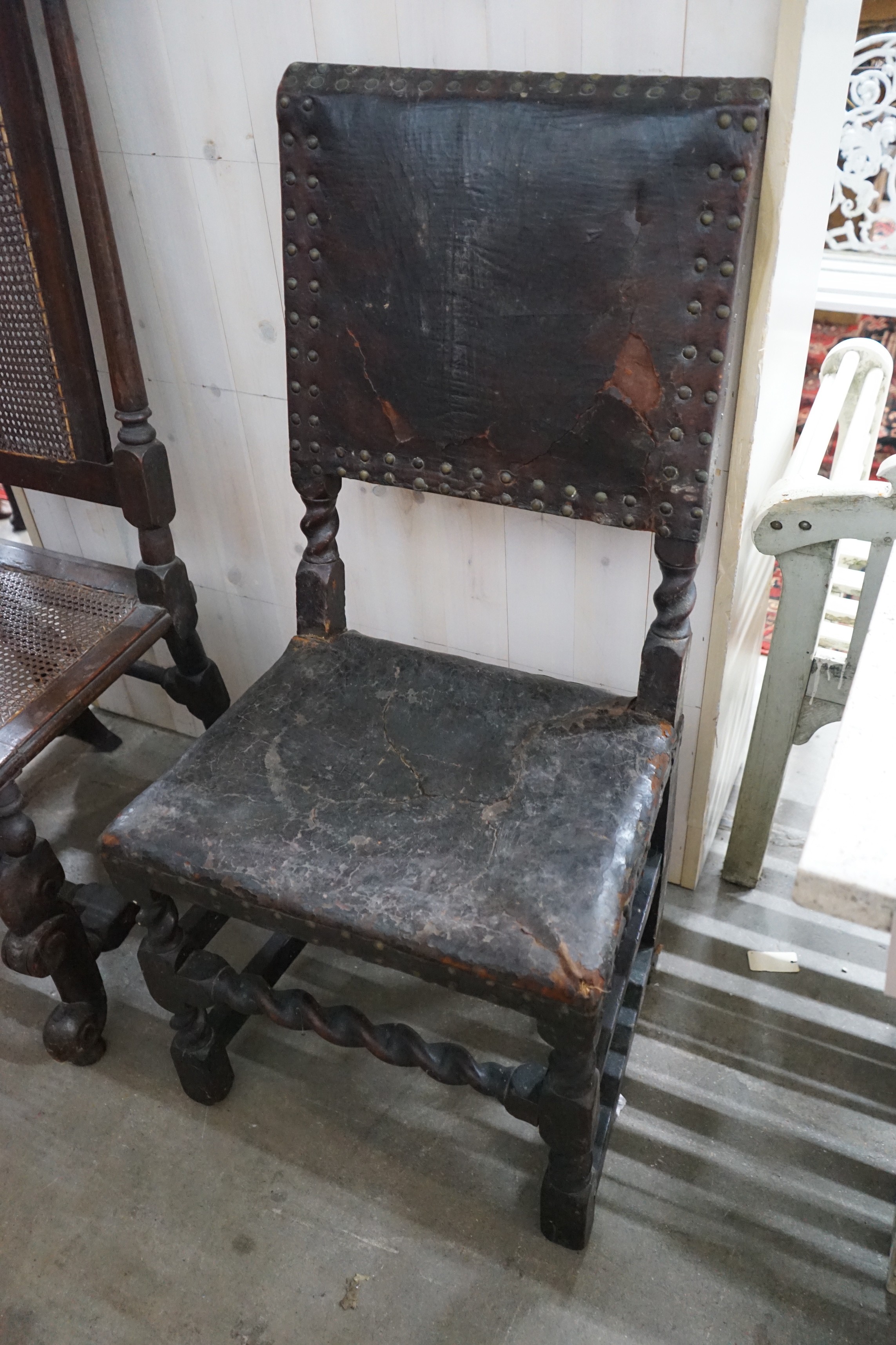 A Carolean style caned high back dining chair together with two other chairs